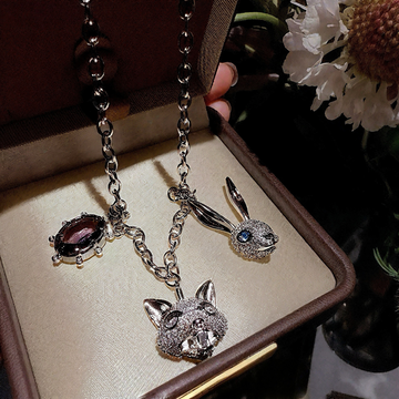 Animal-Inspired Pendant Necklace: Fox & Rabbit with Purple Zircon
